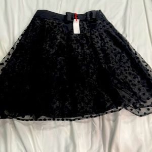 This is brand new ELLE brand,size 8,black skirt.